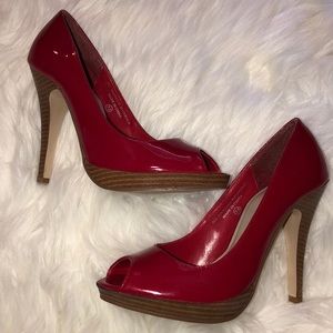 Never worn red patent leather heels